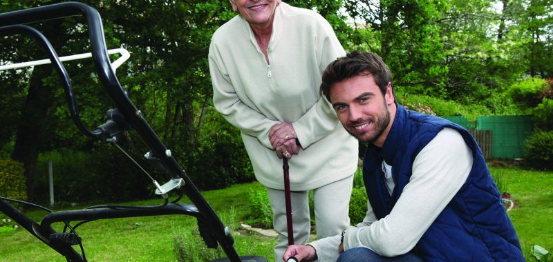 Son helping Mother in the garden